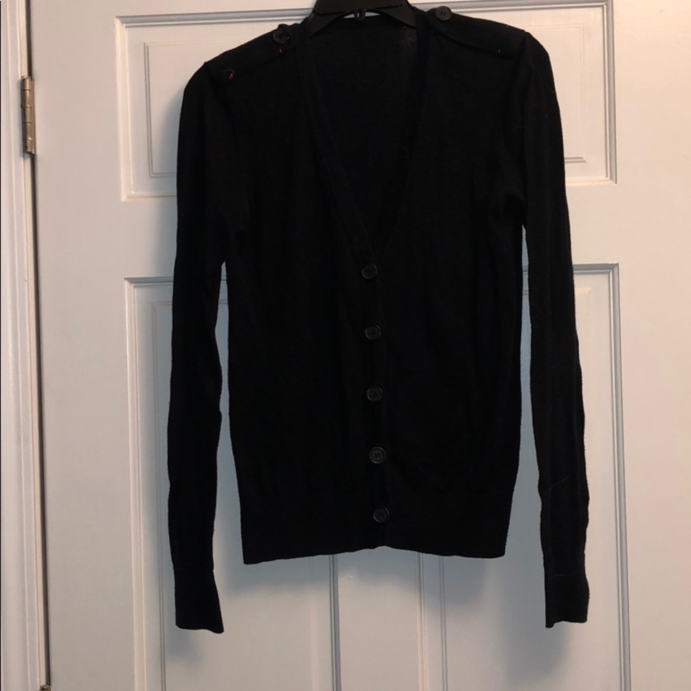 Black cardigan with red thread detail